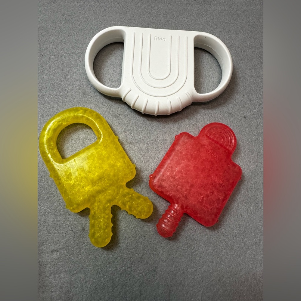 Frida Baby not too cold to hold teething set with Red and Yellow Teethers
